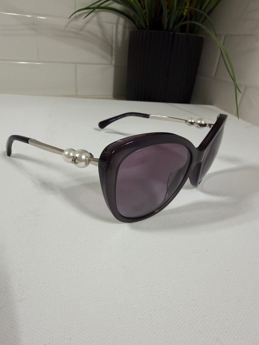 Chanel Authentic Purple Sunglasses . Pearl accents. Excellent condition .